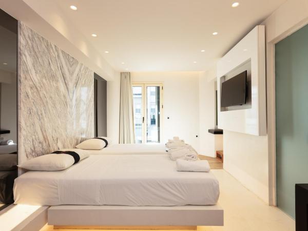 Kahlua Sea View Suites : photo 1 de la chambre suite junior - vue latérale sur mer