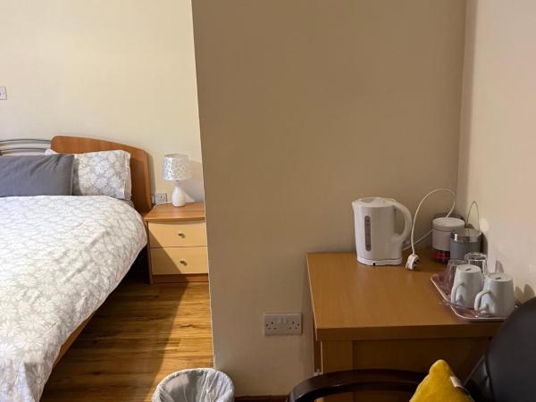 Douglasha House V93RX64 : photo 5 de la chambre chambre lit king-size