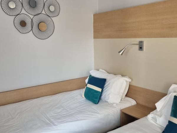 Hotel Cantosorgue : photo 9 de la chambre chambre lits jumeaux