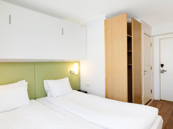 Good Morning+ Göteborg City : photo 1 de la chambre chambre triple standard