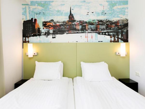 Good Morning+ Göteborg City : photo 1 de la chambre chambre lits jumeaux standard