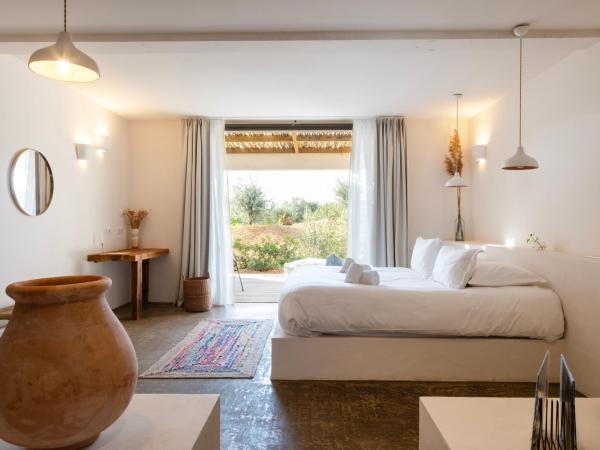 VILLA FLAKA Boutique Hôtel Confidentiel et Convivial : photo 4 de la chambre suite - vue sur jardin