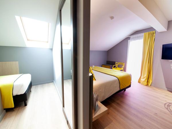 Quality Hotel Clermont Kennedy : photo 3 de la chambre suite avec 1 lit queen-size et 1 lit simple - non-fumeurs