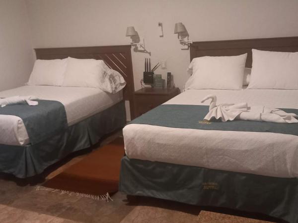 Casa Esmeralda Hotel : photo 8 de la chambre chambre lits jumeaux standard avec canapé