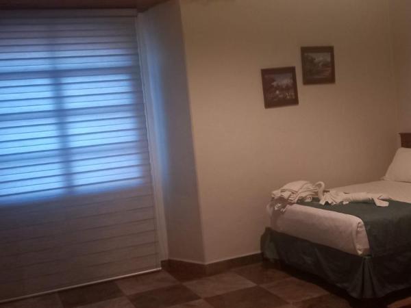 Casa Esmeralda Hotel : photo 7 de la chambre chambre lits jumeaux standard avec canapé