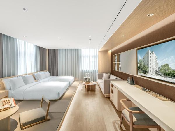 HOTEL ANDI Townscape Wuhan : photo 1 de la chambre chambre familiale