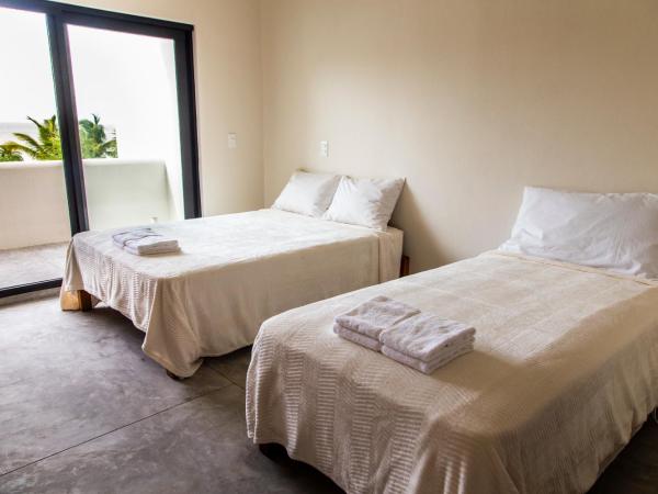 Ikarus Costa Mujeres Eco Lodge Sunset View : photo 4 de la chambre chambre double avec salle de bains privative