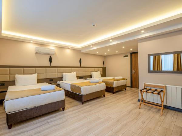 MAGİA HOTEL : photo 2 de la chambre chambre triple