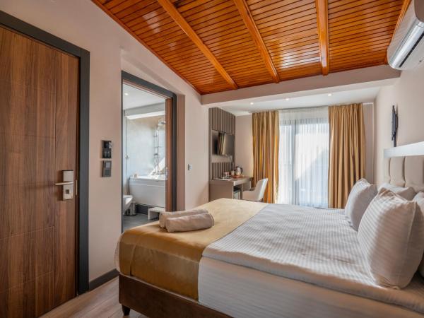 MAGİA HOTEL : photo 7 de la chambre chambre double - vue sur mer