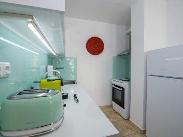 Lucky Suites : photo 9 de la chambre suite lit king-size avec balcon