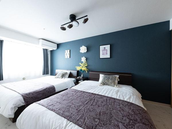 AMS TOWER : photo 10 de la chambre suite - vue sur jardin