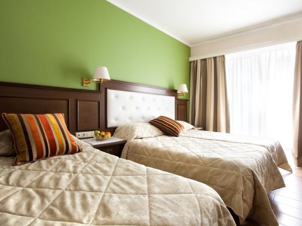 Achillion Palace : photo 1 de la chambre chambre triple