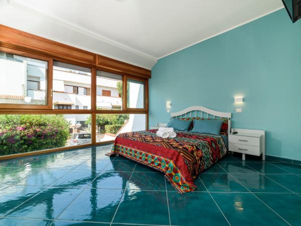 Il Papavero Residence Arbostella : photo 2 de la chambre appartement avec terrasse