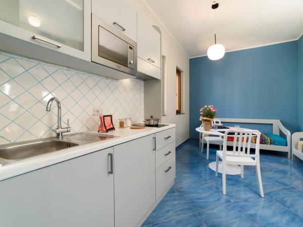 Il Papavero Residence Arbostella : photo 2 de la chambre appartement 1 chambre avec balcon