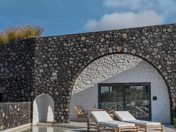 Santo Pure Oia Suites & Villas : photo 10 de la chambre suite junior troglodyte avec piscine