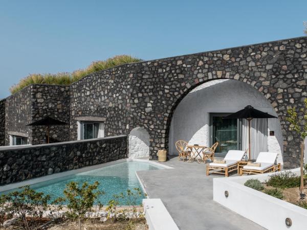 Santo Pure Oia Suites & Villas : photo 2 de la chambre suite junior troglodyte avec piscine