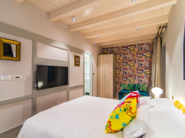 The Melegran : photo 3 de la chambre chambre deluxe (2 adultes + 1 enfant)