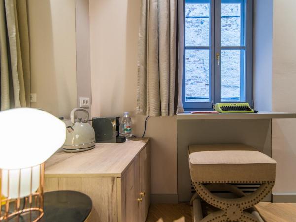 The Melegran : photo 7 de la chambre chambre deluxe (2 adultes + 1 enfant)