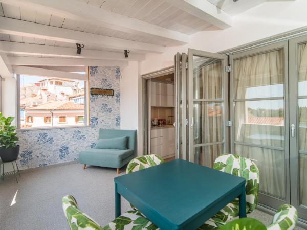 The Melegran : photo 4 de la chambre deluxe suite with sea view and balcony with external access