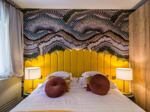 The Melegran : photo 1 de la chambre chambre lits jumeaux de luxe - annexe