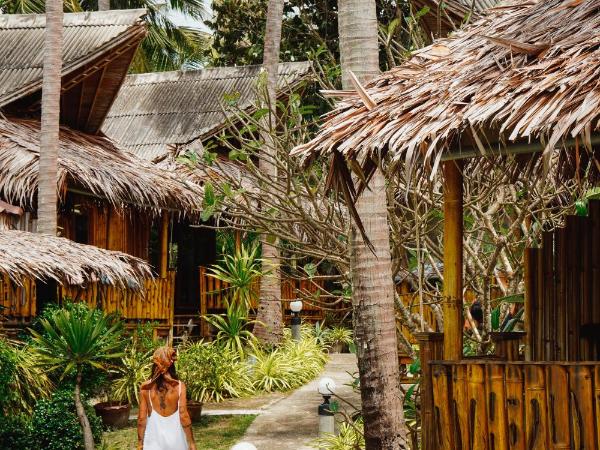 Lazy Days Bungalows : photo 1 de la chambre bungalow - vue sur jardin