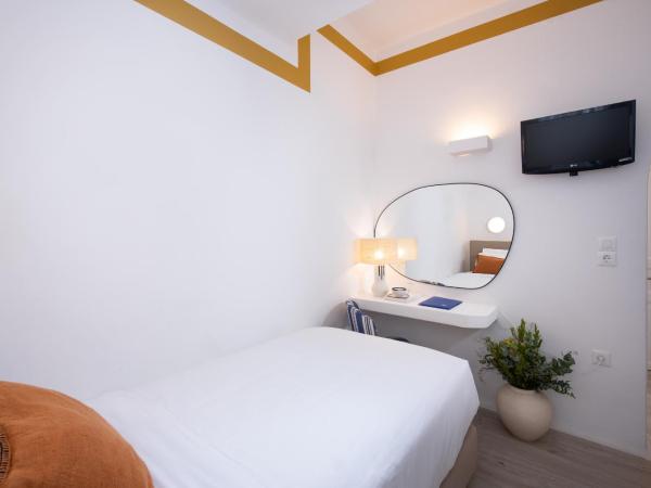 Hotel Tagoo : photo 1 de la chambre petite chambre simple