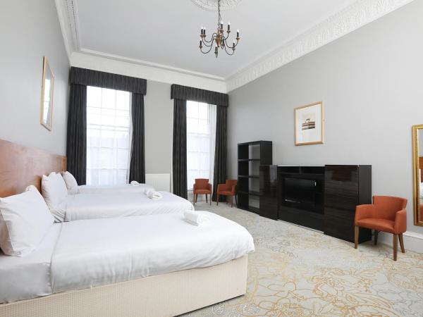 Cairn Hotel & Apartments : photo 3 de la chambre maison 4 chambres