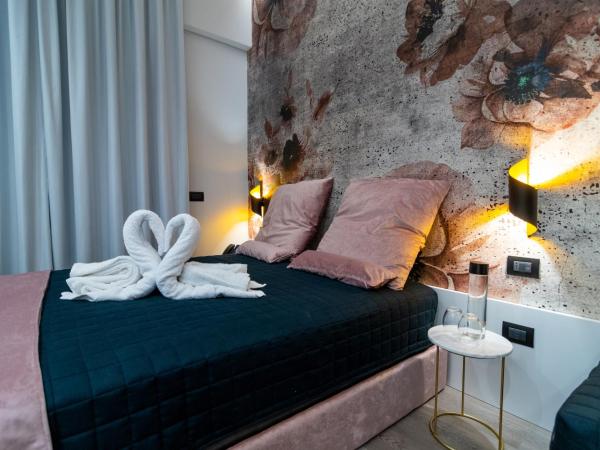 DOMUS VESUVIO : photo 2 de la chambre chambre lit king-size avec baignoire spa