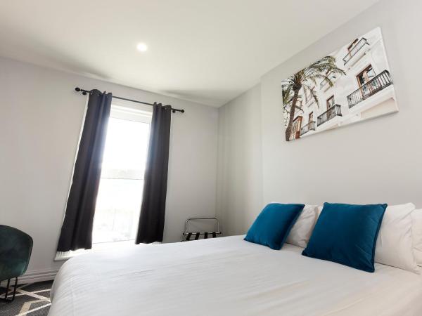 Sports Garden Hotel : photo 1 de la chambre chambre lit queen-size