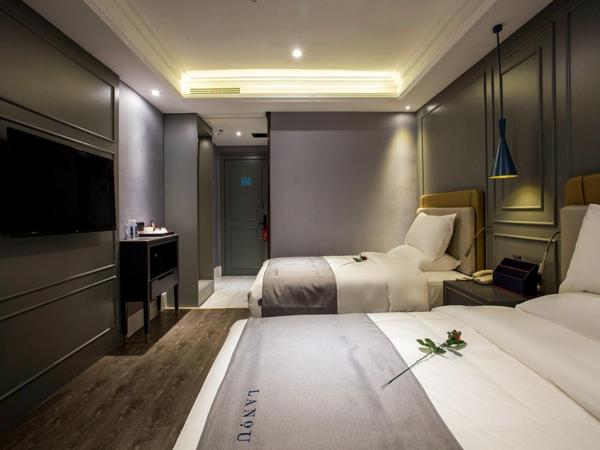 LanOu Hotel Wuhan CapitaMall Wusheng Road Metro Station : photo 2 de la chambre chambre lits jumeaux deluxe