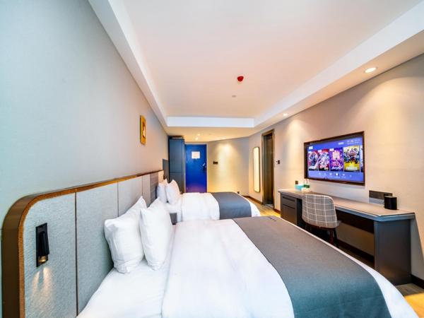 LanOu Hotel Wuhan CapitaMall Wusheng Road Metro Station : photo 1 de la chambre executive twin room