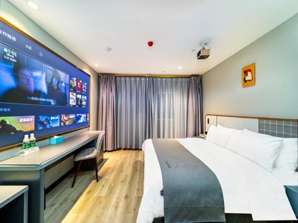 LanOu Hotel Wuhan CapitaMall Wusheng Road Metro Station : photo 5 de la chambre lanyi double room with movie