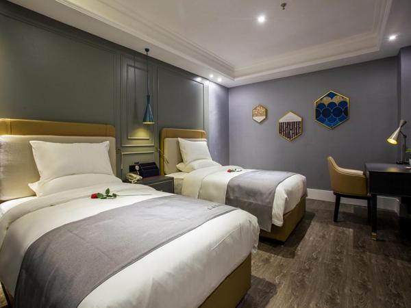 LanOu Hotel Wuhan CapitaMall Wusheng Road Metro Station : photo 5 de la chambre chambre lits jumeaux deluxe