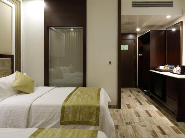 Regenta Inn Ranip Ahmedabad : photo 2 de la chambre chambre double ou lits jumeaux deluxe 
