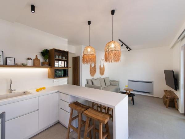 Pnoe - Feel at Home : photo 2 de la chambre appartement - vue sur jardin