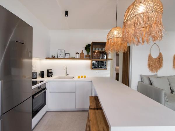 Pnoe - Feel at Home : photo 6 de la chambre appartement - vue sur jardin