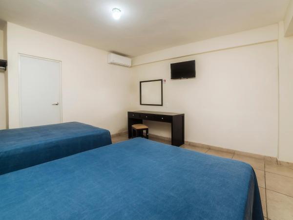 Hotel Puerto Inn : photo 4 de la chambre chambre lits jumeaux