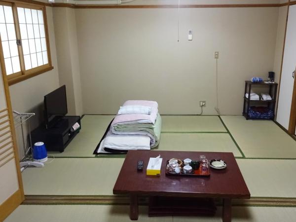 Imazato Ryokan : photo 2 de la chambre chambre quadruple avec salle de bains commune