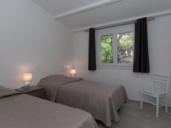 Résidence Marina Di Santa Giulia : photo 6 de la chambre villa classique 4 chambres