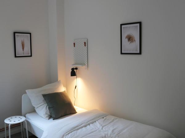 Schlafkonzept Hannover : photo 4 de la chambre chambre lits jumeaux standard avec salle de bains commune