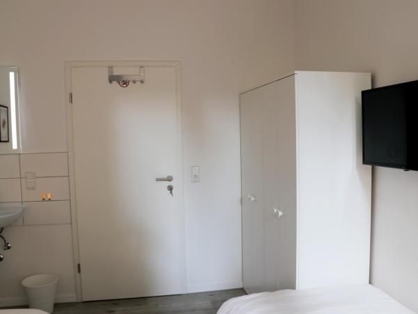 Schlafkonzept Hannover : photo 6 de la chambre chambre lits jumeaux standard avec salle de bains commune