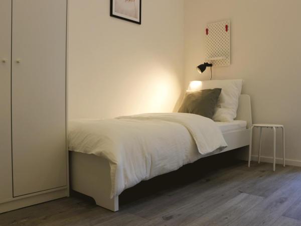 Schlafkonzept Hannover : photo 6 de la chambre chambre triple avec salle de bains privative