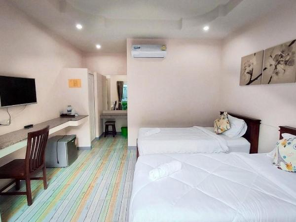 Baanloksouylokchay : photo 6 de la chambre chambre double ou lits jumeaux supérieure - vue sur jardin