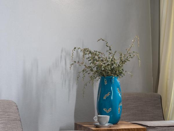 Nefeles Luxury Suites : photo 5 de la chambre suite supérieure avec jacuzzi - vue sur coucher de soleil 