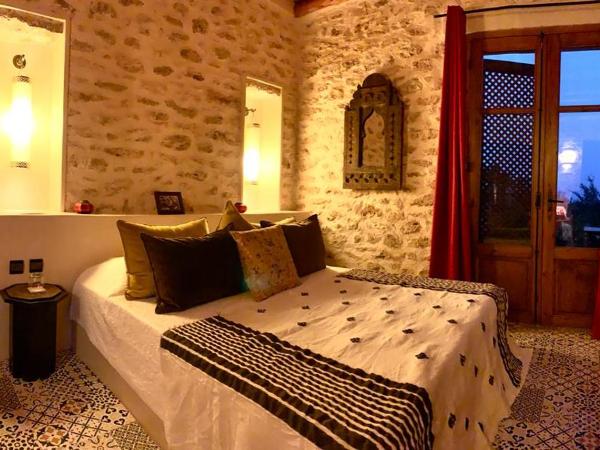 Villa des Hauts Mogador : photo 5 de la chambre chambre double avec lit d'appoint