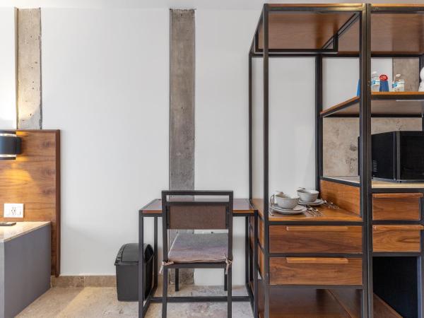 Morelos By HomiRent : photo 10 de la chambre suite lit king-size