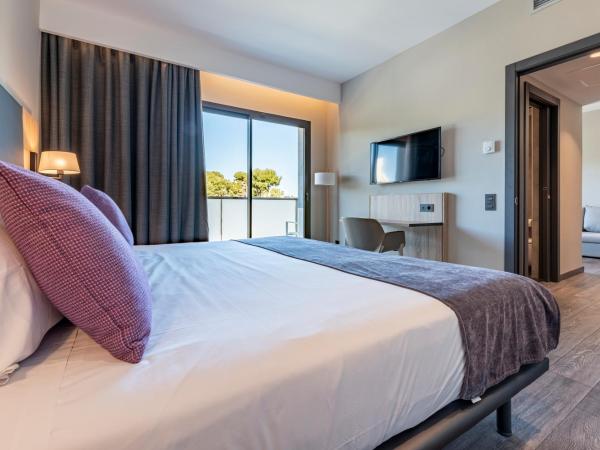 Astari : photo 4 de la chambre chambre familiale avec balcon - vue sur ville