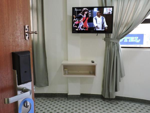 Merlin Hotel Penang : photo 6 de la chambre studio lits jumeaux