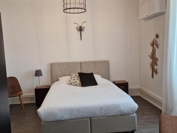 Hipster suites - Chez Axelle - : photo 1 de la chambre chambre triple