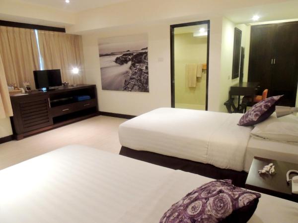 Hotel Tropicana Pattaya : photo 7 de la chambre chambre deluxe double ou lits jumeaux